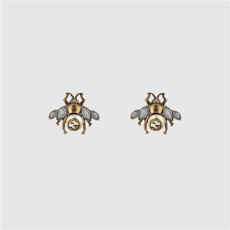 Gucci Boucles d'oreilles abeilles avec cristaux.